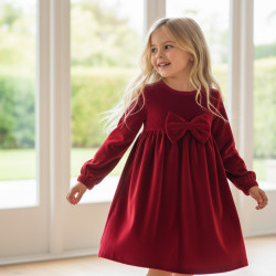 Velour dress with a bow